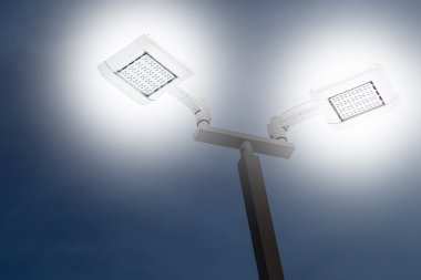 LED outdoor car park flood light working on night, saving energy